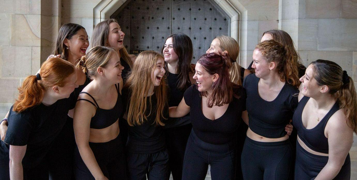 Student dancers smiling