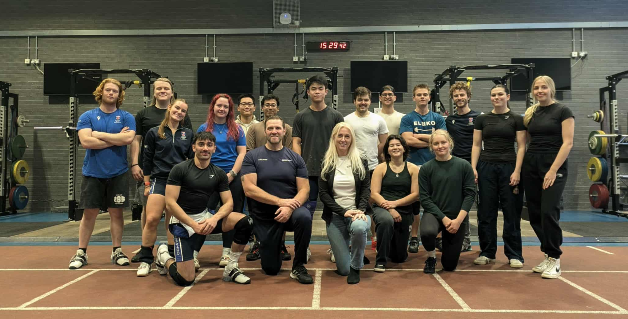 A group photograph showing members of the University's weightlifting club in the Saints Sport performance suite.