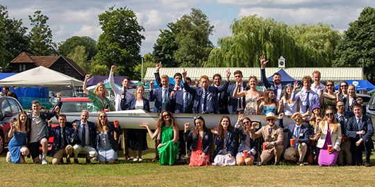 group of people with boat