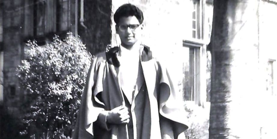 A 1960s black and white portrait of a young man from Trinidad and Tobago. He is pictured wearing the student gown of the University of St Andrews. A 1960s black and white portrait of a young man from Trinidad and Tobago. He is pictured wearing the student gown of the University of St Andrews.