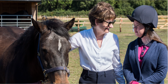 principal with horse and horse rider