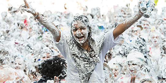 student covered in foam